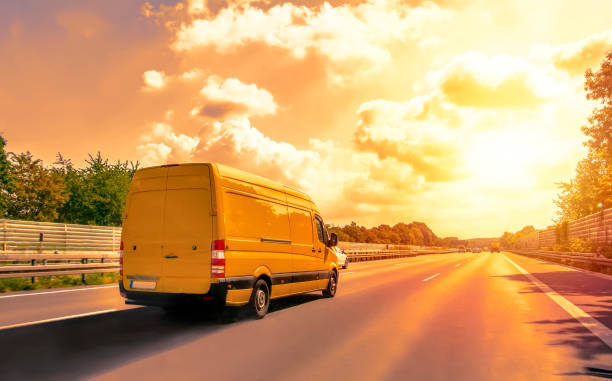 istock Truck with container on highway, cargo transportation concept. 1180826828