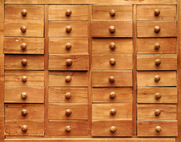 istock Wooden cabinet with opened drawers 1180828742