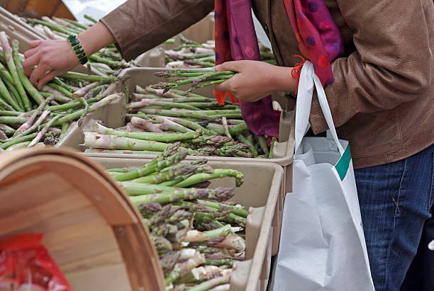 Buying asparagus at the farmer's market