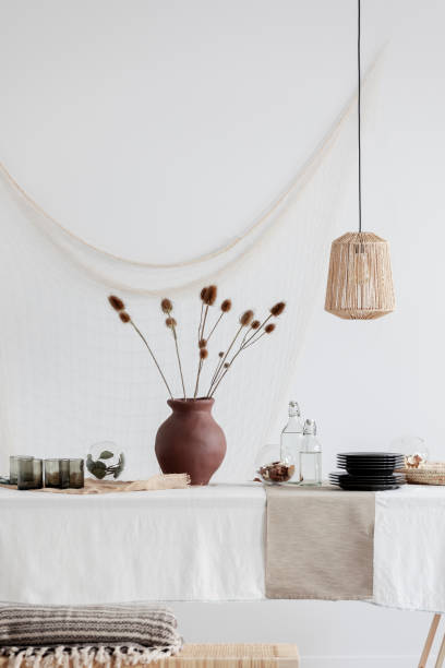 istock Clay vase on the table in vintage kitchen 1180840296