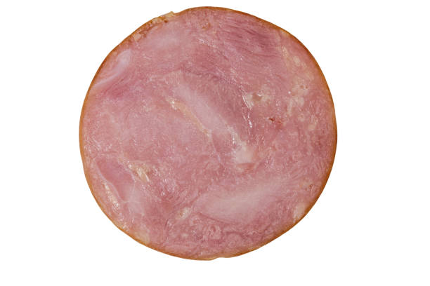 istock Slice of smoked sausage isolated on white background 1180840433