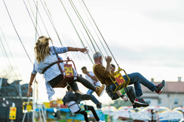 istock Chain swing ride at amusement park! 1180842865