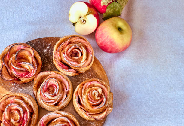 istock Apple rose pastries of puffed dough 1180843007