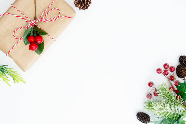istock Christmas background, mock up with gift boxes and winter decoration., on white background. Winter holidays. Top view with copy space. 1180843047