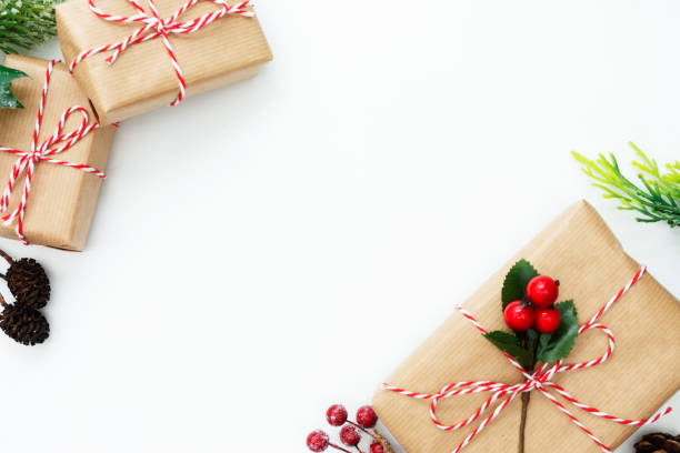 istock Christmas background, mock up with gift boxes and winter decoration., on white background. Winter holidays. Top view with copy space. 1180843052