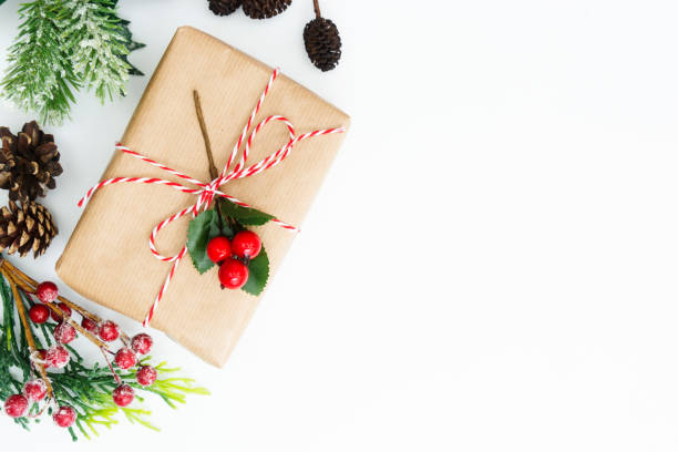 istock Christmas background, mock up with gift boxes and winter decoration., on white background. Winter holidays. Top view with copy space. 1180843058