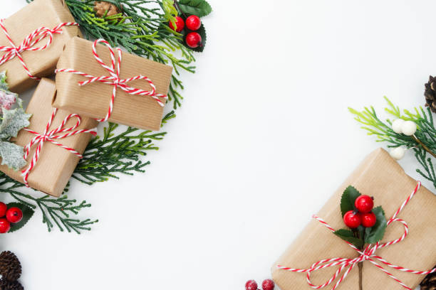 istock Christmas background, mock up with gift boxes and winter decoration., on white background. Winter holidays. Top view with copy space. 1180843099