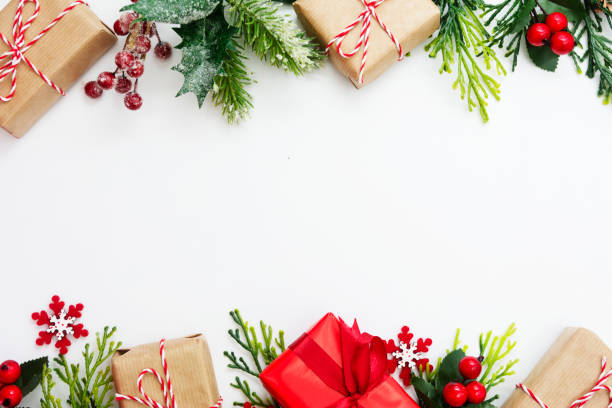 istock Christmas background, mock up with gift boxes and winter decoration., on white background. Winter holidays. Top view with copy space. 1180843109
