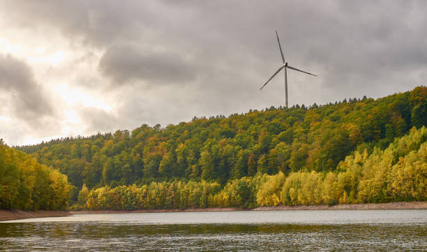 istock Windmills above lake 