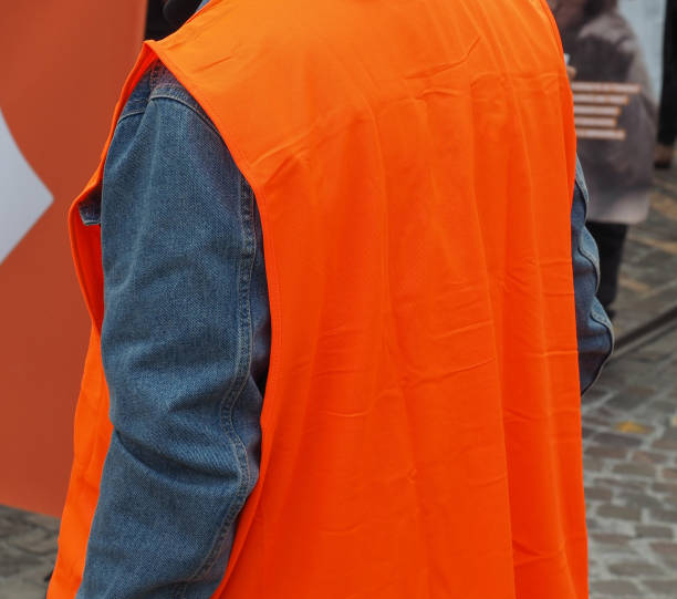 istock orange safety vest 1180847719