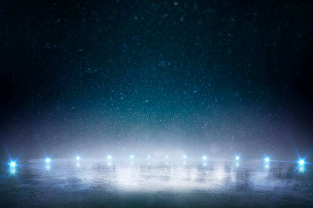 istock Night ice rink. Winter background with blue lights 1180848601