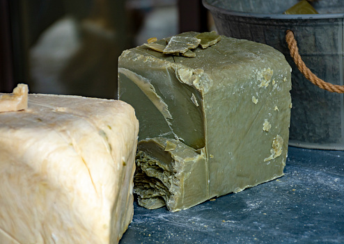 Hand made from natural ingredients and oils soap in blocks in shop, Provence, South of France, close up