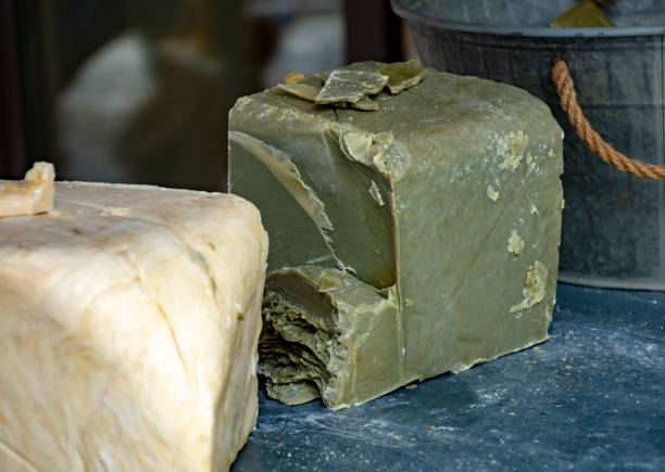 Hand made from natural ingredients and oils soap in blocks in shop close up Hand made from natural ingredients and oils soap in blocks in shop, Provence, South of France, close up savon stock pictures, royalty-free photos & images