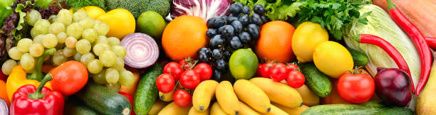 istock Background useful fruits and vegetables. 1180851425