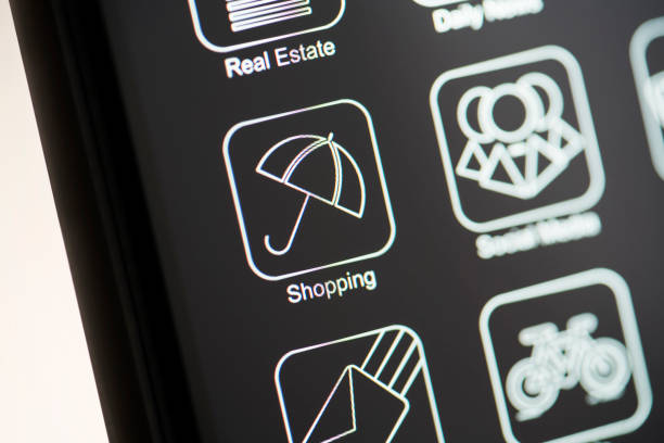 istock Shopping app on dark mode phone screen 1180851471