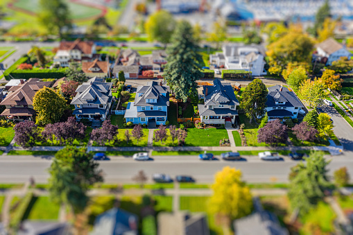 Photo of a small town neighborhood with tilt-shift lens effect applied to give tiny appearance