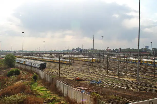 Trains parked on tracks in the metrorail commuter train station in Johannesburg, South Africa