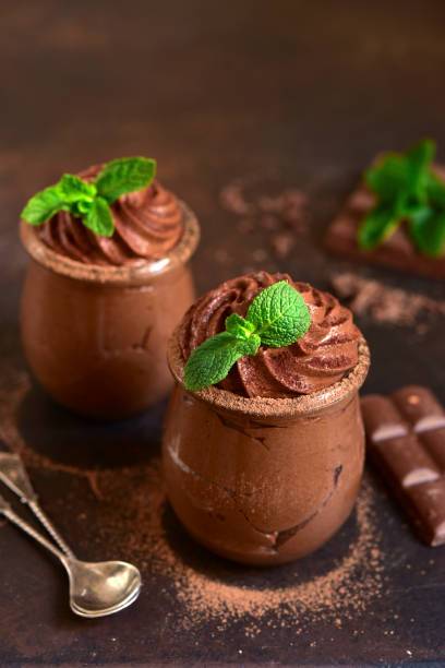 istock Homemade delicious chocolate mousse with mint 1180854829
