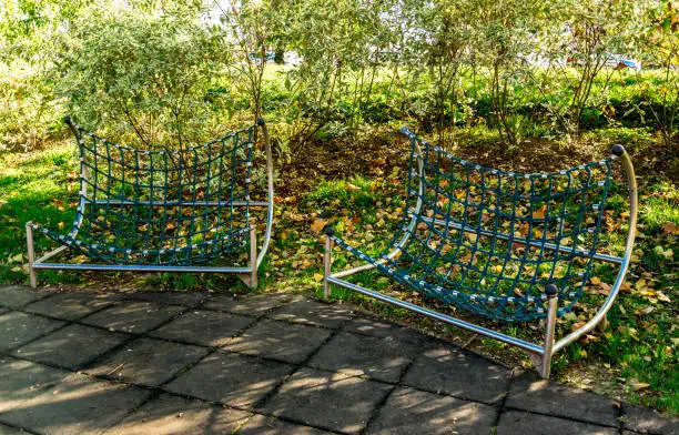 Photo of Hammock type seats on a children playground in Bindek city park