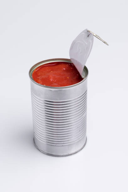 istock Tin of chopped canned tomatoes, isolated on white background, soft light 1180857913