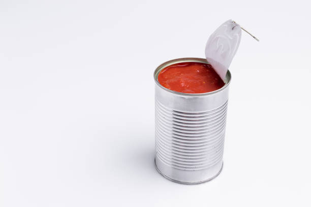 istock Tin of chopped canned tomatoes, isolated on white background, soft light 1180857918
