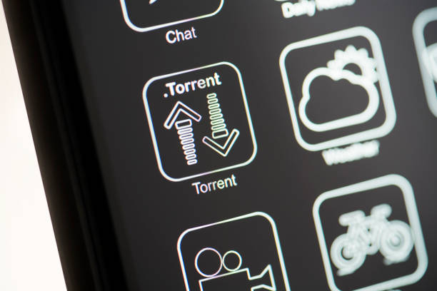 istock Torrent app on dark mode phone screen 1180857947