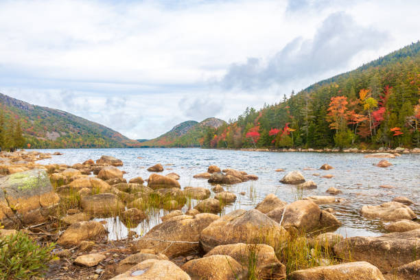 istock Small rocks on the shore of Jordan Pond 1180862477