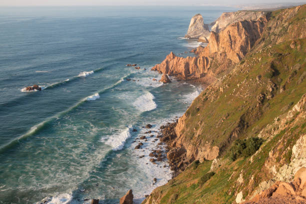 istock Waves and cliffs on Cabo da Roca, Portugal. 1180863432