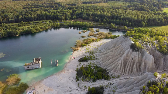 Abandoned mines and houses. Quarry and old prison cottage architecture. The ashes dunes in  Estonia, Europe.