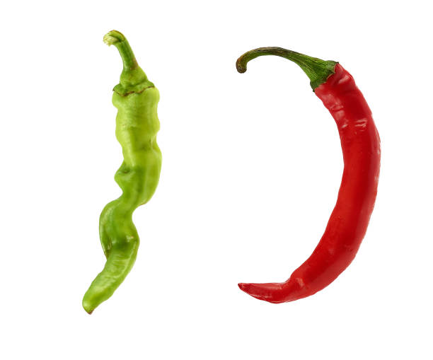 istock red and green chili peppers isolated on a white background 1180866318