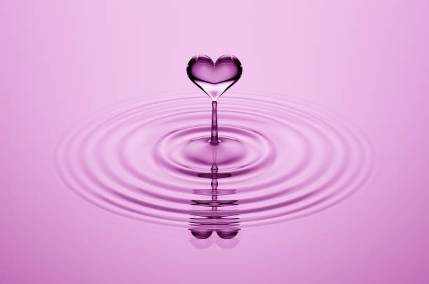 istock 3D Pink Heart Shaped Water Droplet 1180866448