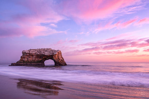 istock Sunset View of Natural Bridges Rock Formation 1180876763