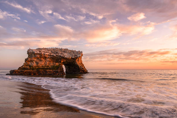 istock Sunset View of Natural Bridges Rock Formation 1180876889