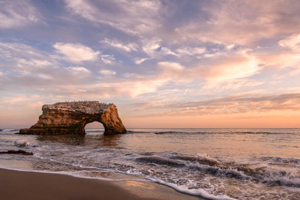 istock Sunset View of Natural Bridges Rock Formation 1180877809