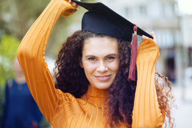 istock Happy graduate girl 1180879426