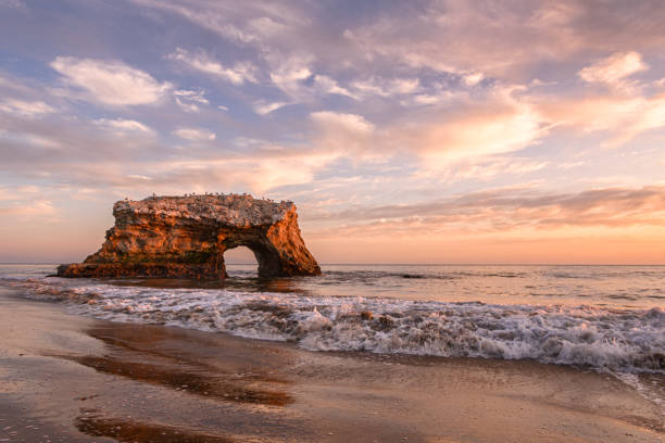 istock Sunset View of Natural Bridges Rock Formation 1180879698