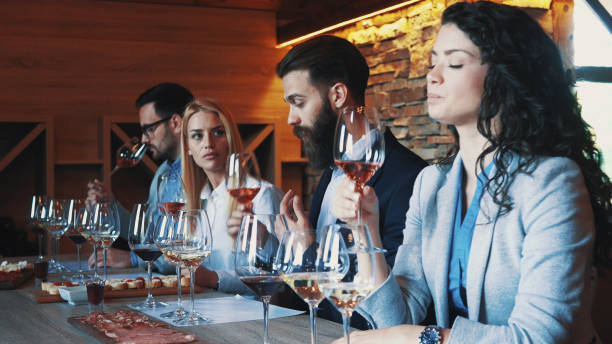 istock Friends tasting wine together 1180890096