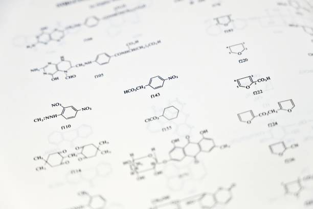 Chemical graph of benzene and pencil on bright background