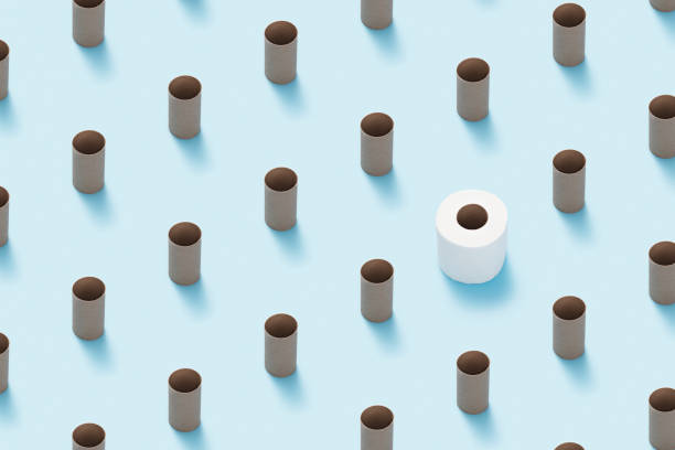 istock Toilet paper roll flat lay on blue background. 1180892604