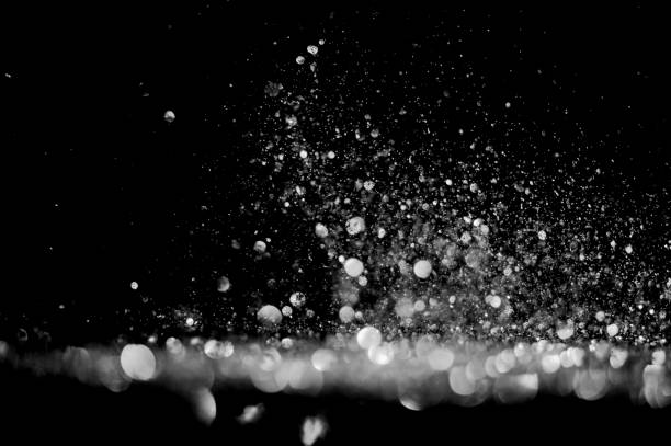 istock glitter lights grunge black and white background for graphic design resources. 1180892645