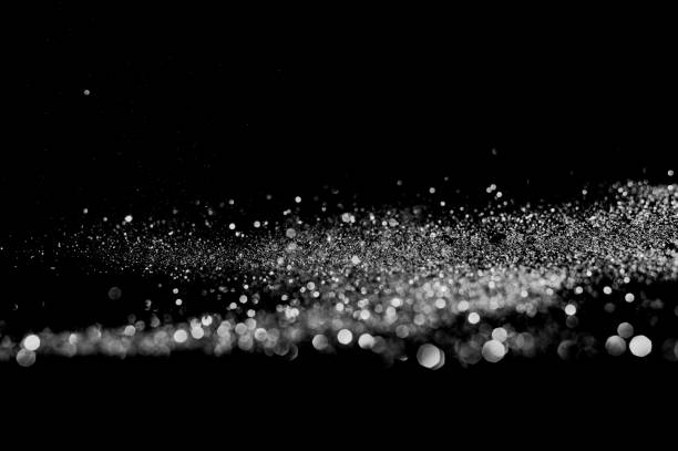 istock glitter lights grunge black and white background for graphic design resources. 1180892678