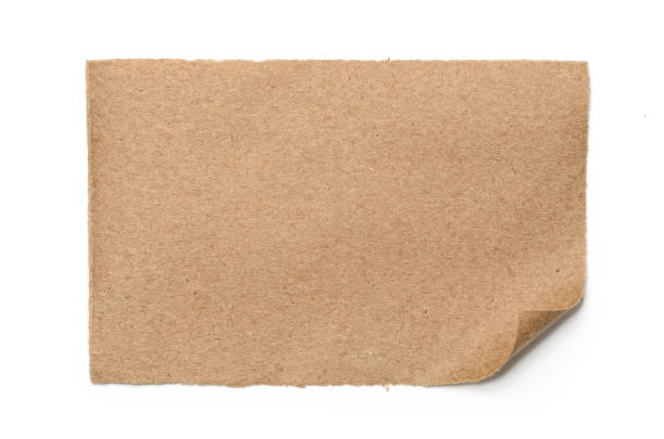 istock Sheet of brown, old paper isolated on a white background 1180893425
