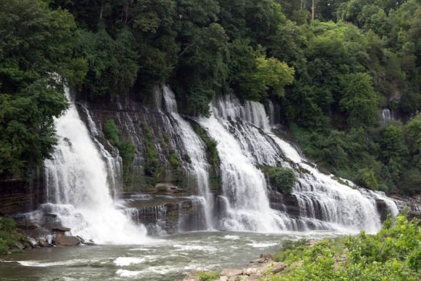 istock Multiple waterfalls over layers of rock. 1180893523