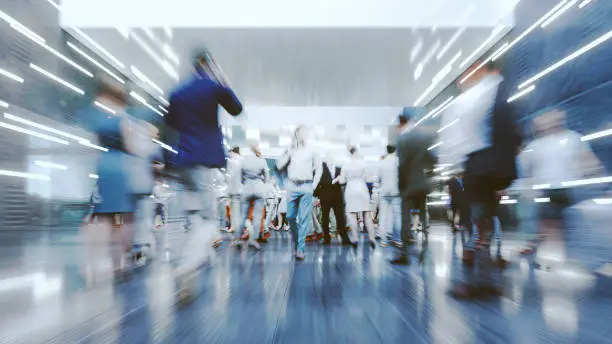 Motion blur of modern commuters in the city. This is entirely 3D generated image.