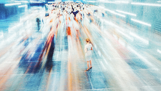 Businesswoman standing in the fast moving crowds of commuters. This is entirely 3D generated image.
