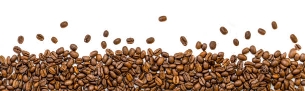 istock Roasted coffee beans, wide background image. Isolated on white background. 1180896652