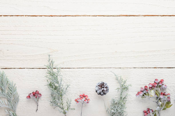 istock New Year composition or Christmas on a white wooden background 1180899730