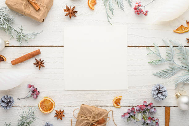 istock frame, Christmas, New Year. Background with composition, with empty postcard space for design. On a white wooden background. 1180900558