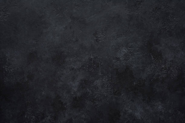 Black concrete wall background Black concrete wall background. Texture of black concrete burnt paper stock pictures, royalty-free photos & images