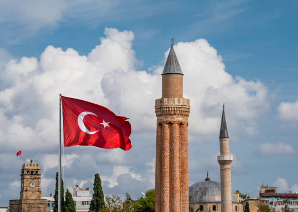 istock Antalya City with Yivli Minaret, Clock Tower and Turkish Flag 1180903270